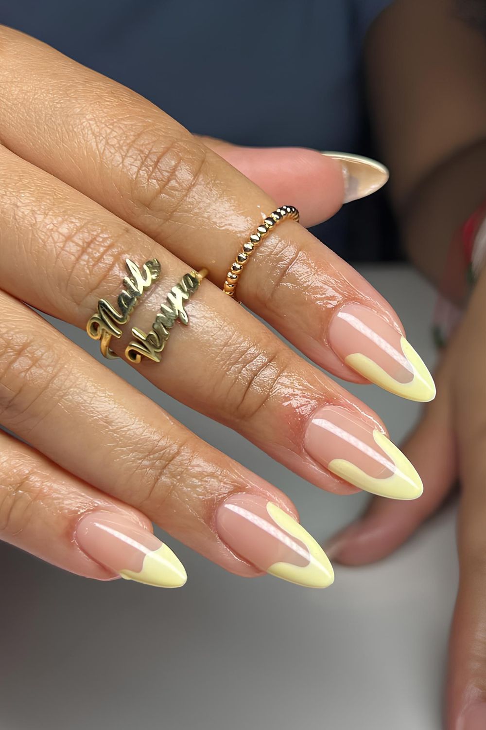 Abstract pastel yellow French tip nails