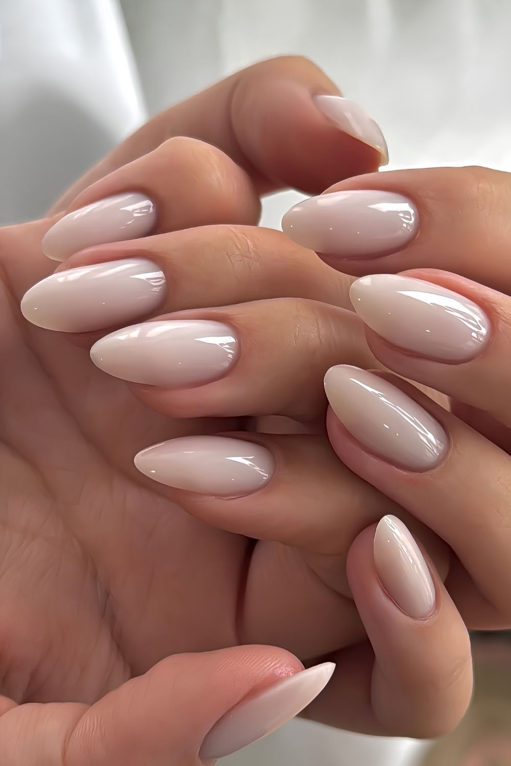 Almond milky white manicure