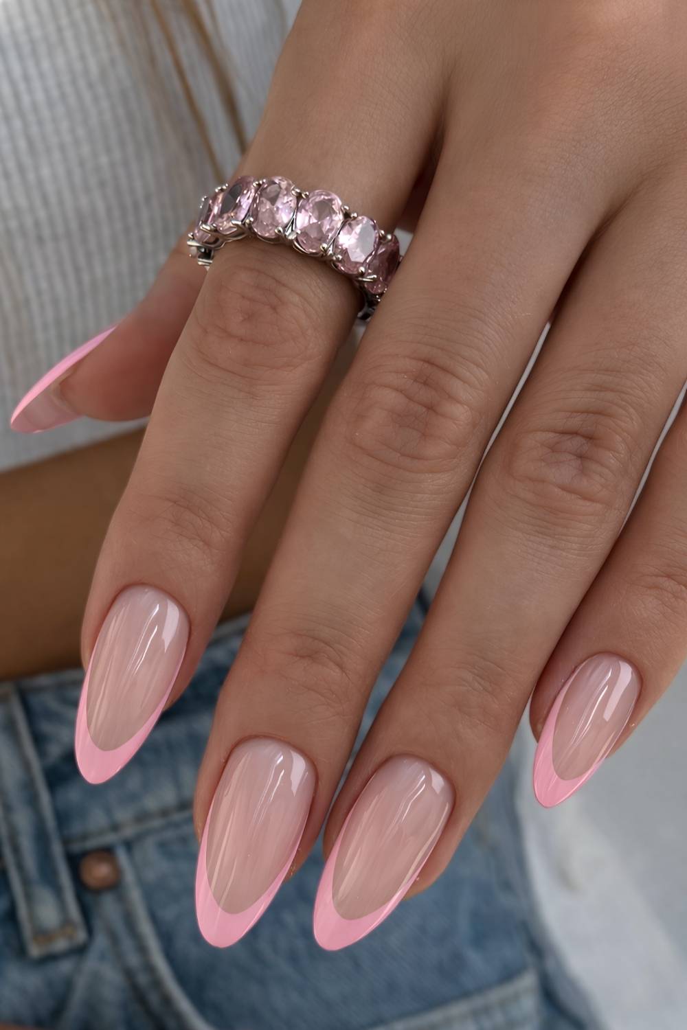 Almond pink French tip manicure