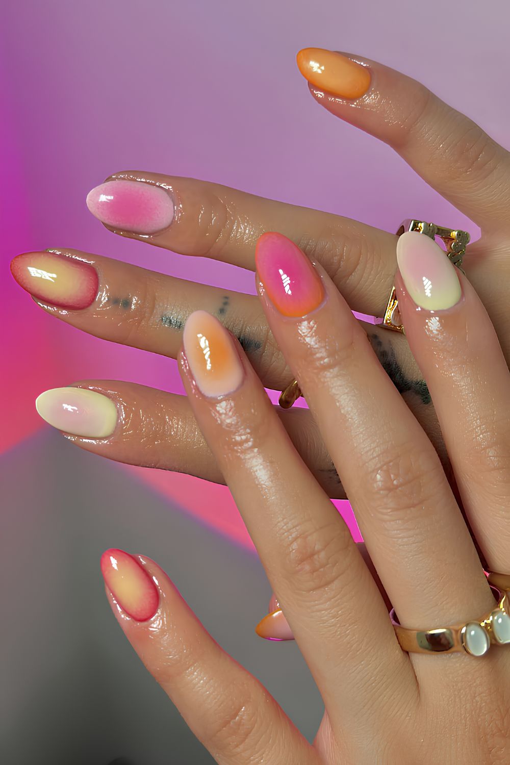 Aura manicure in fruity colors