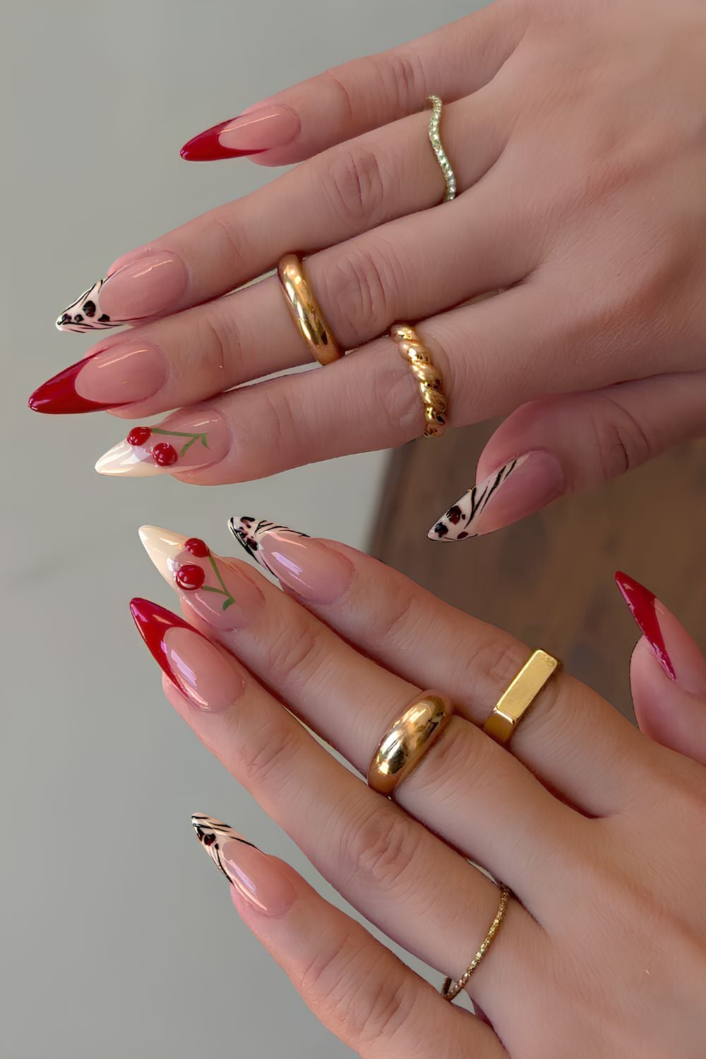 Beige and red French mani with cherries and animal print
