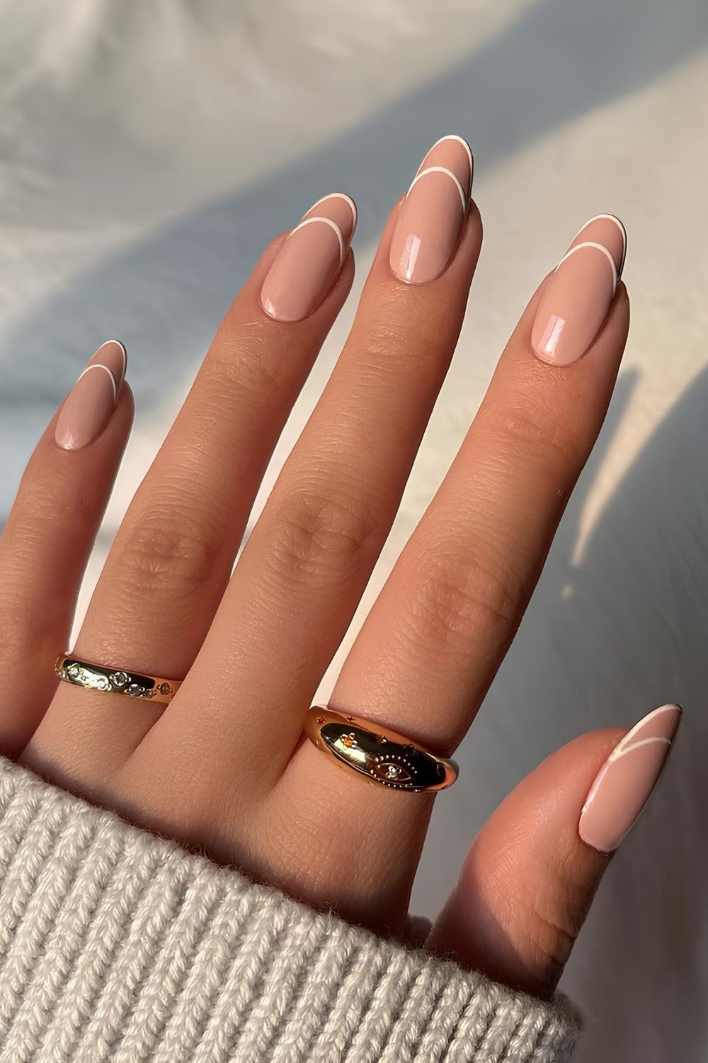Beige based nails with white double French tips