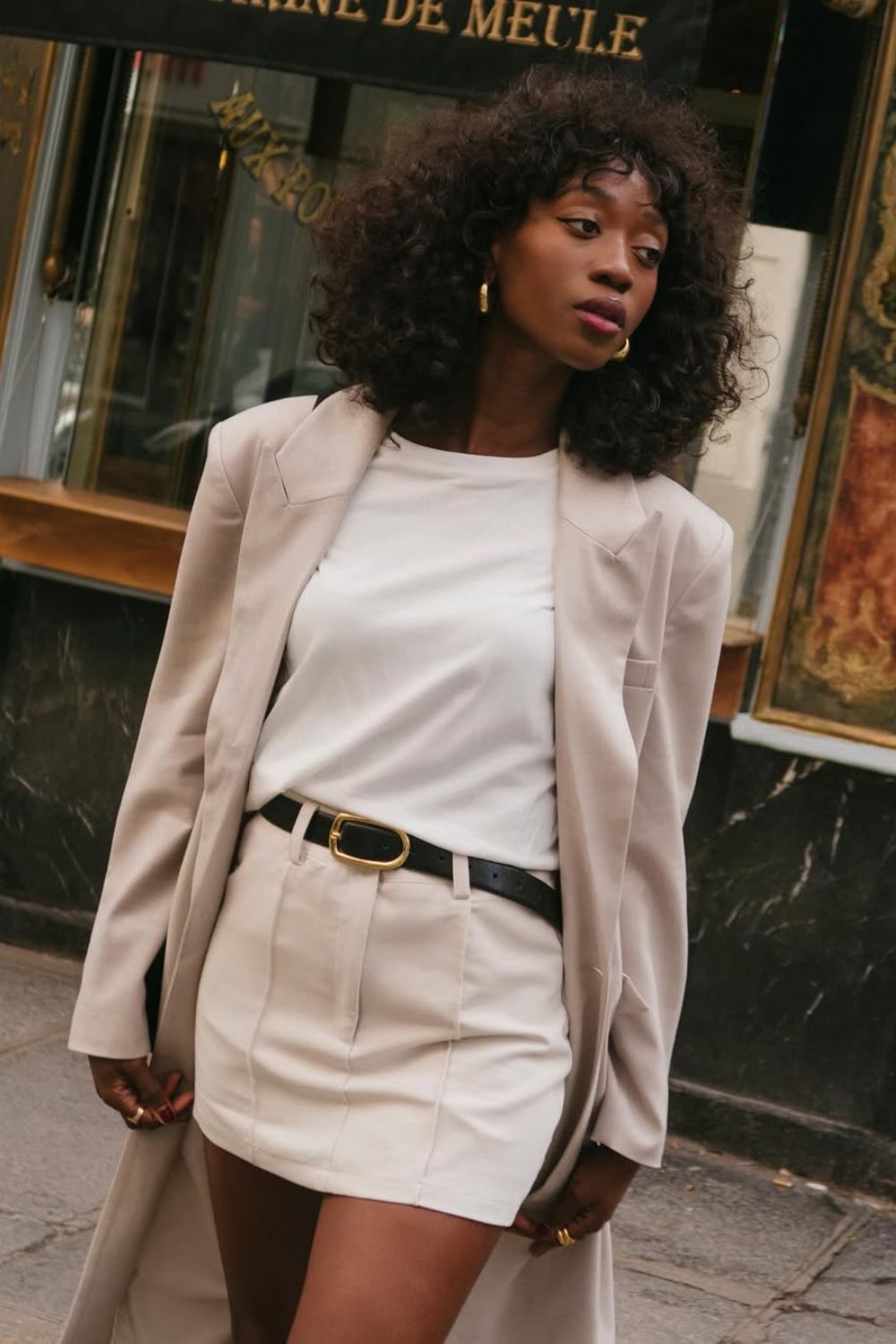 Beige blazer with white t-shirt and mini skirt