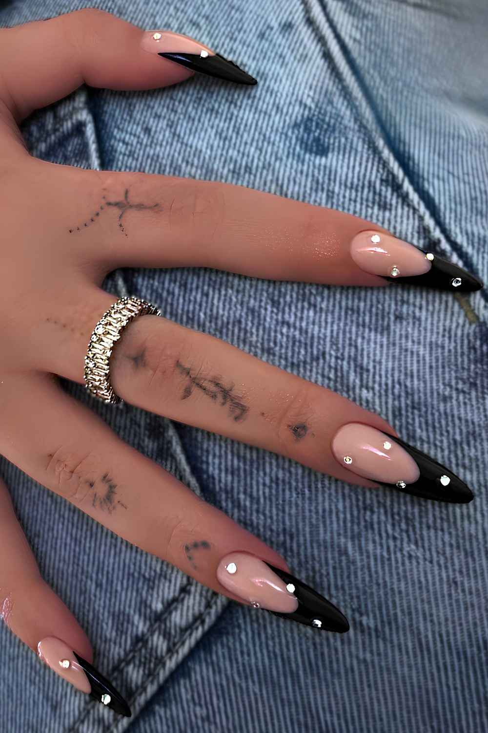 Black French mani with accent rhinestones