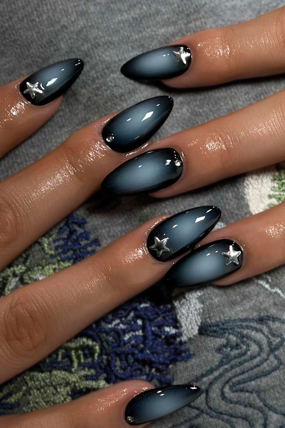 Black and blue aura nails with star art