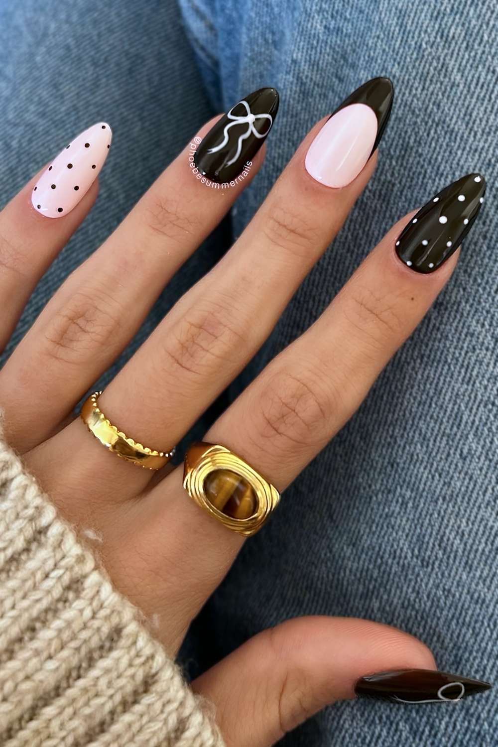 Black and light pink polka dot nails