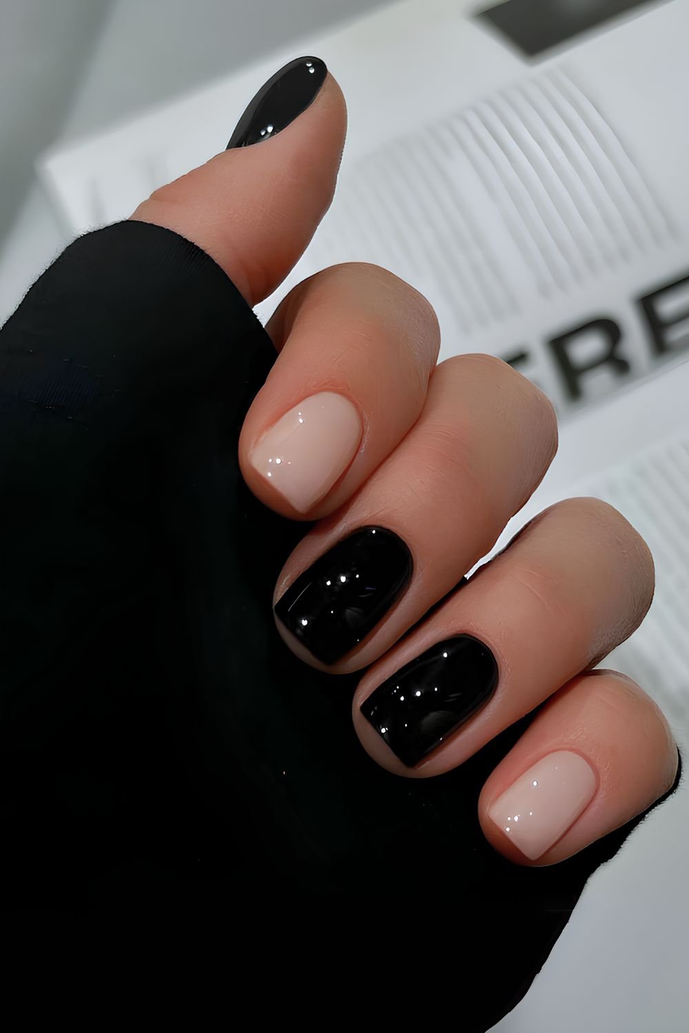 Black and milky white manicure