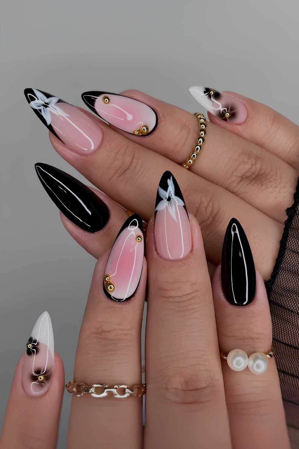 Black and pink nails with flowers and aura