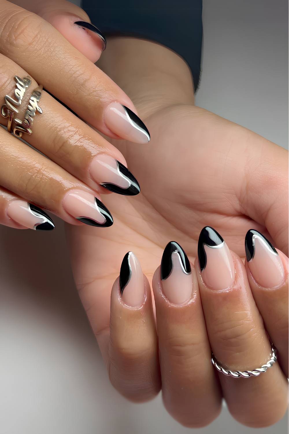 Black and silver drip effect French mani