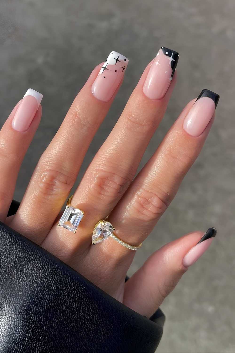 Black and white celestial French tip manicure