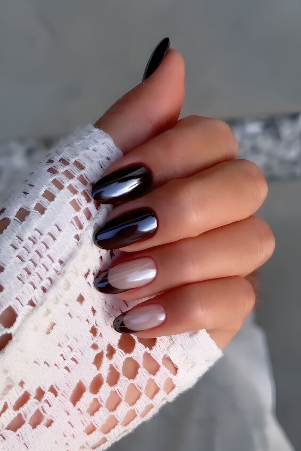 Black chrome nails with accent French tips