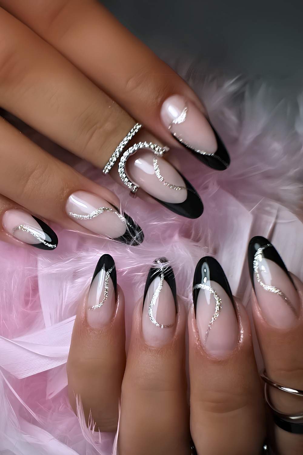 Black french mani with glittery silver swirls