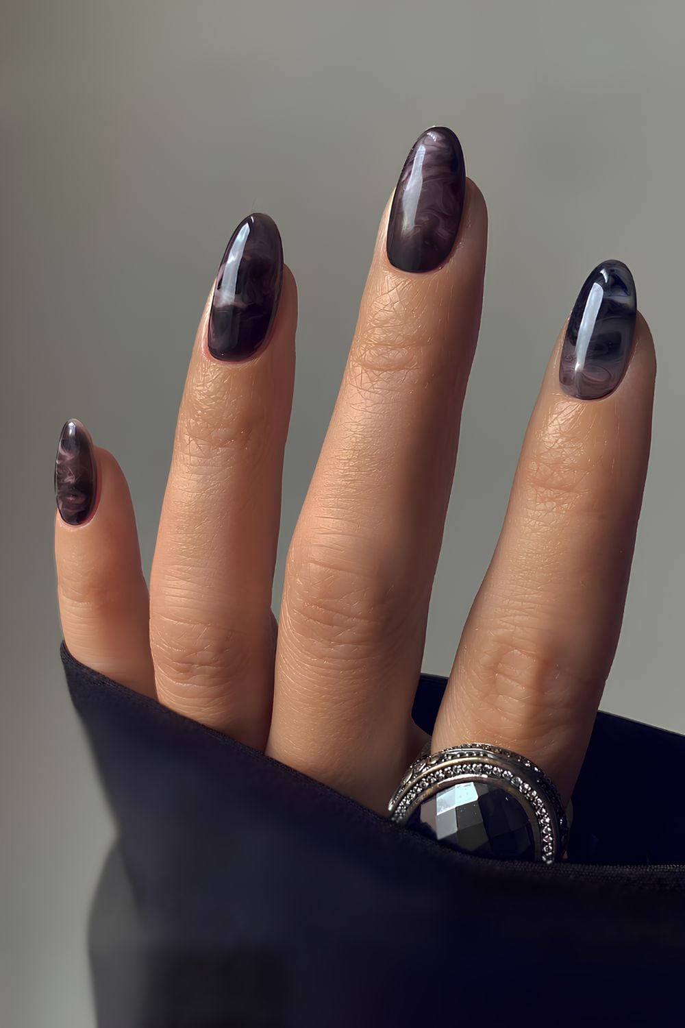 Black jelly marble manicure