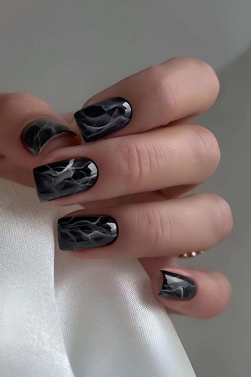 Black mani with white marble effect