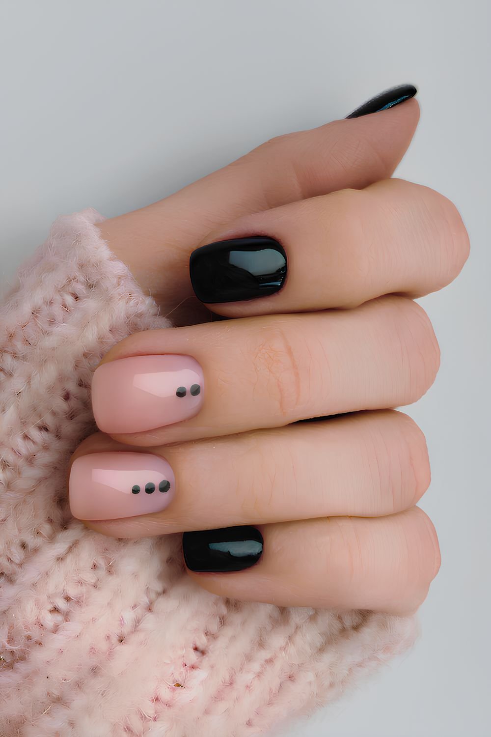 Black manicure with dot details