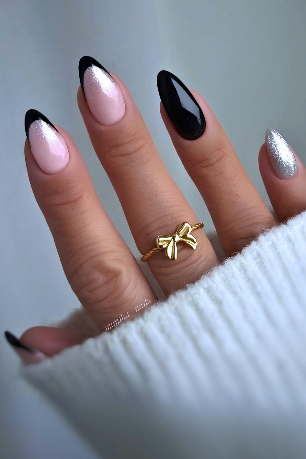 Black manicure with fine silver glitter