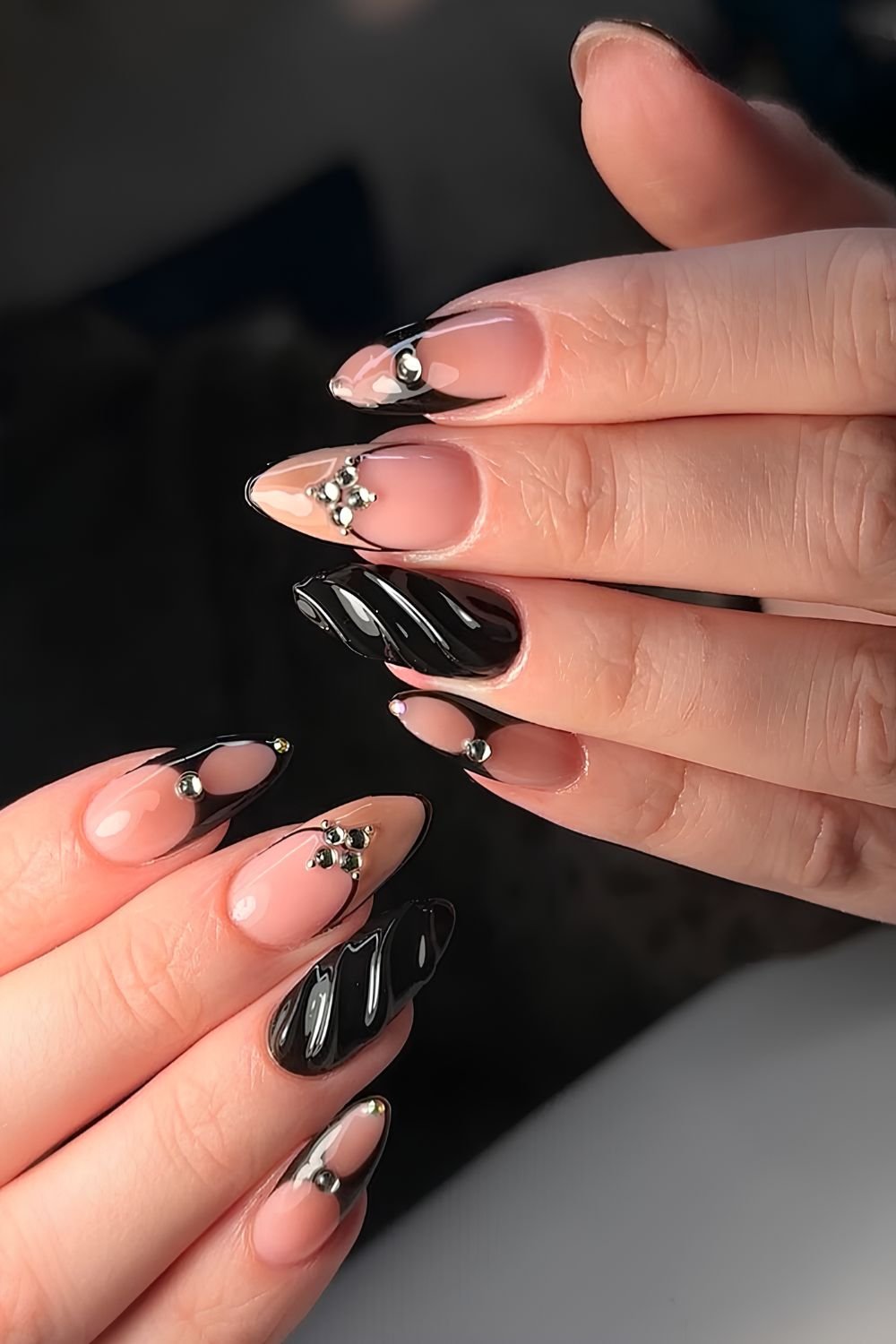 Black mix and match mani with 3d details