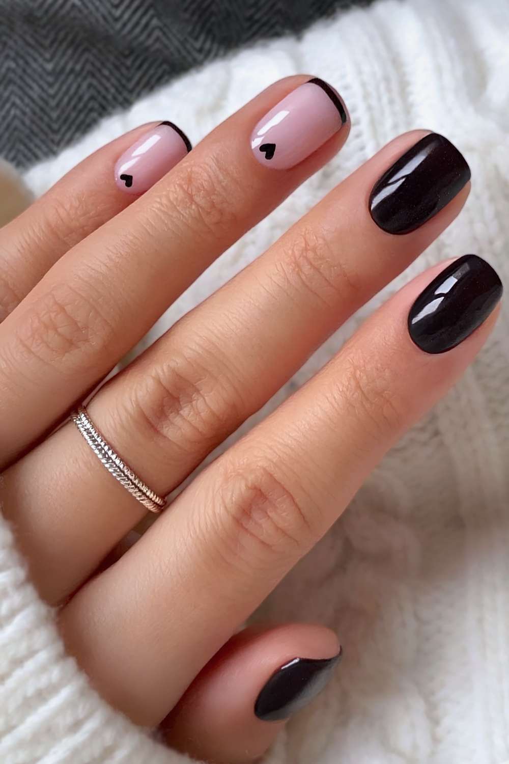 Black nails with hearts and micro French accents