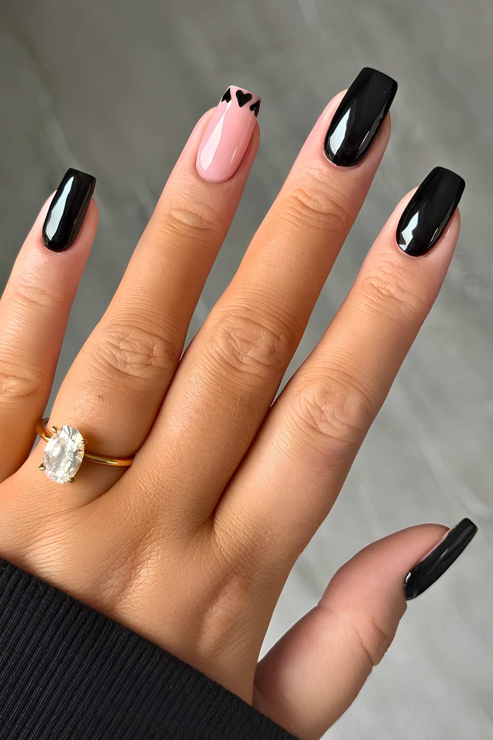 Black nails with tiny heart art