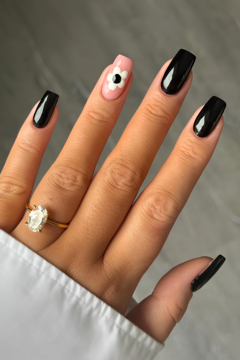 Black nails with white flower art