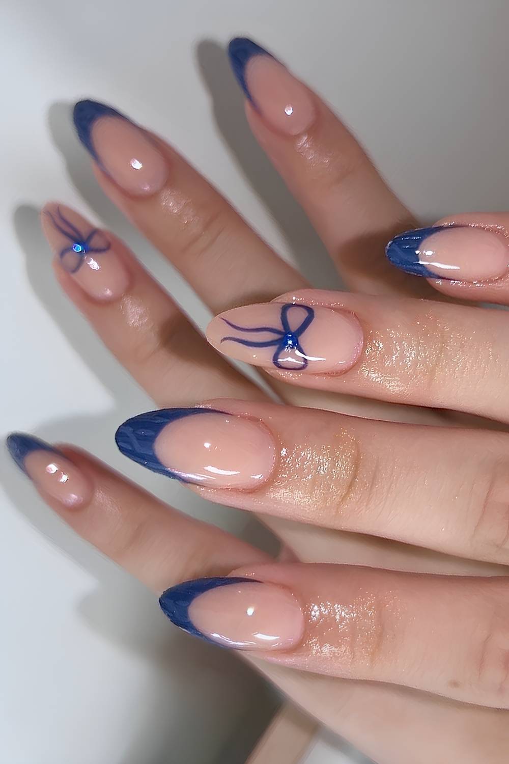 Blue French mani with sweater patterns