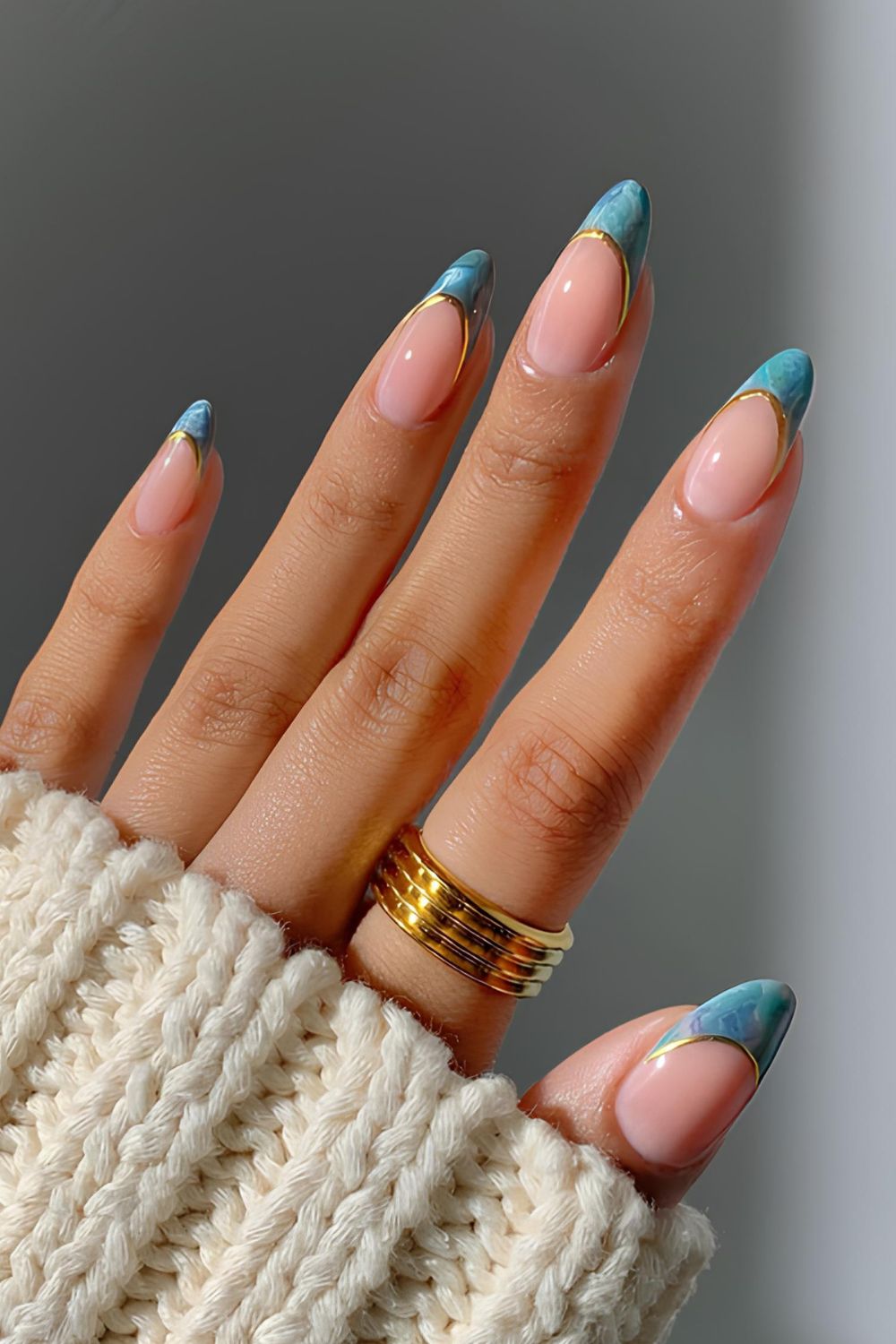 Blue French marble nails with gold outline