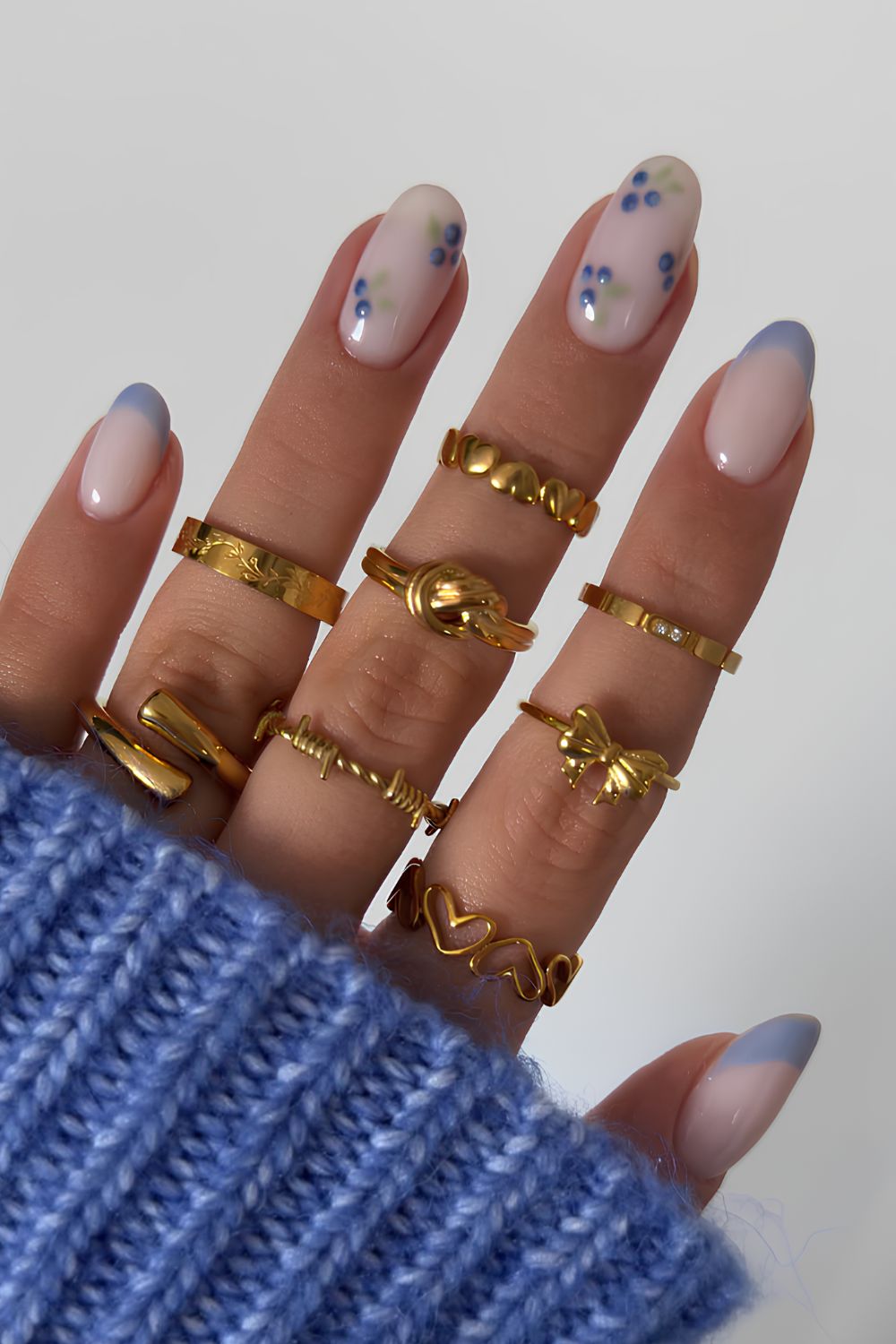 Blue French on a milky base with blueberry art