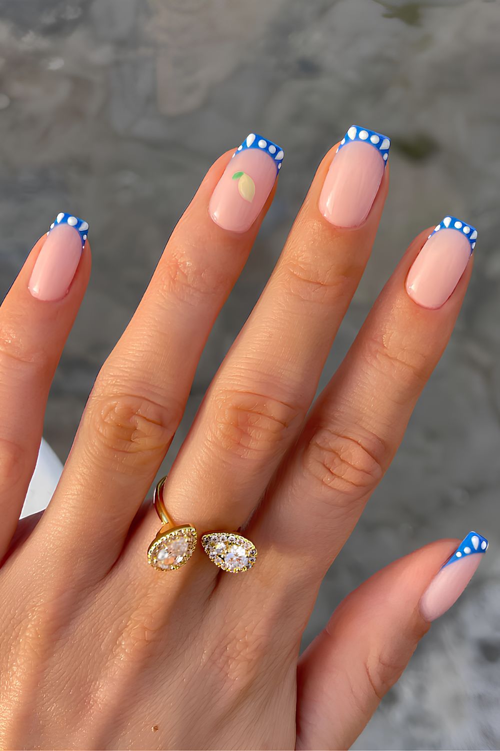 Blue and white micro French tips with lemon accent