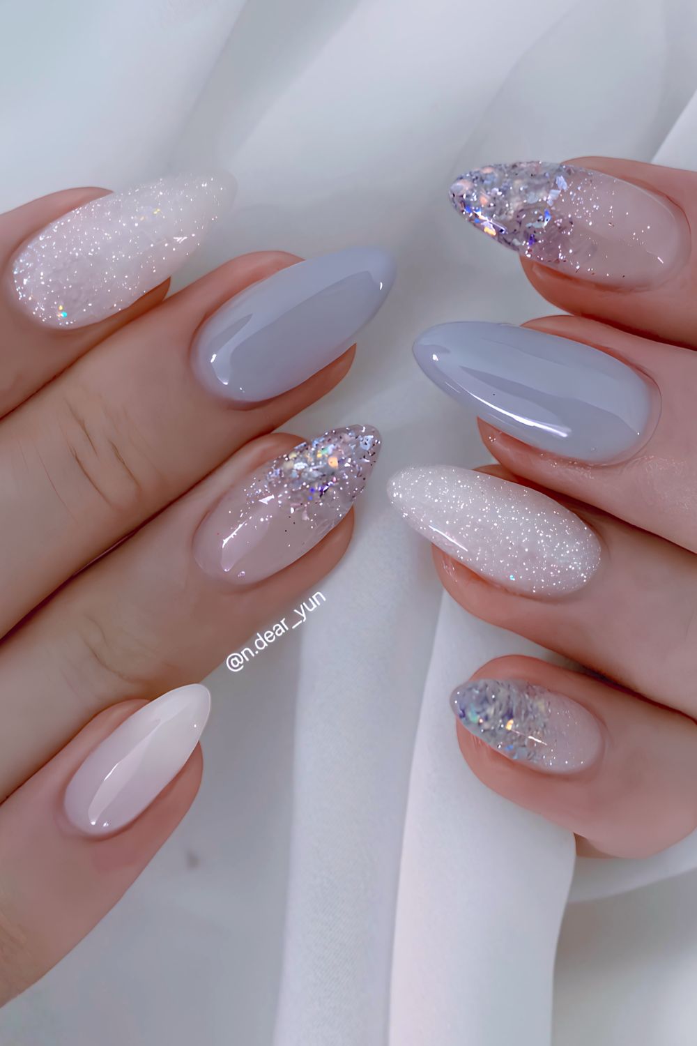 Blue and white nails with accent glitter