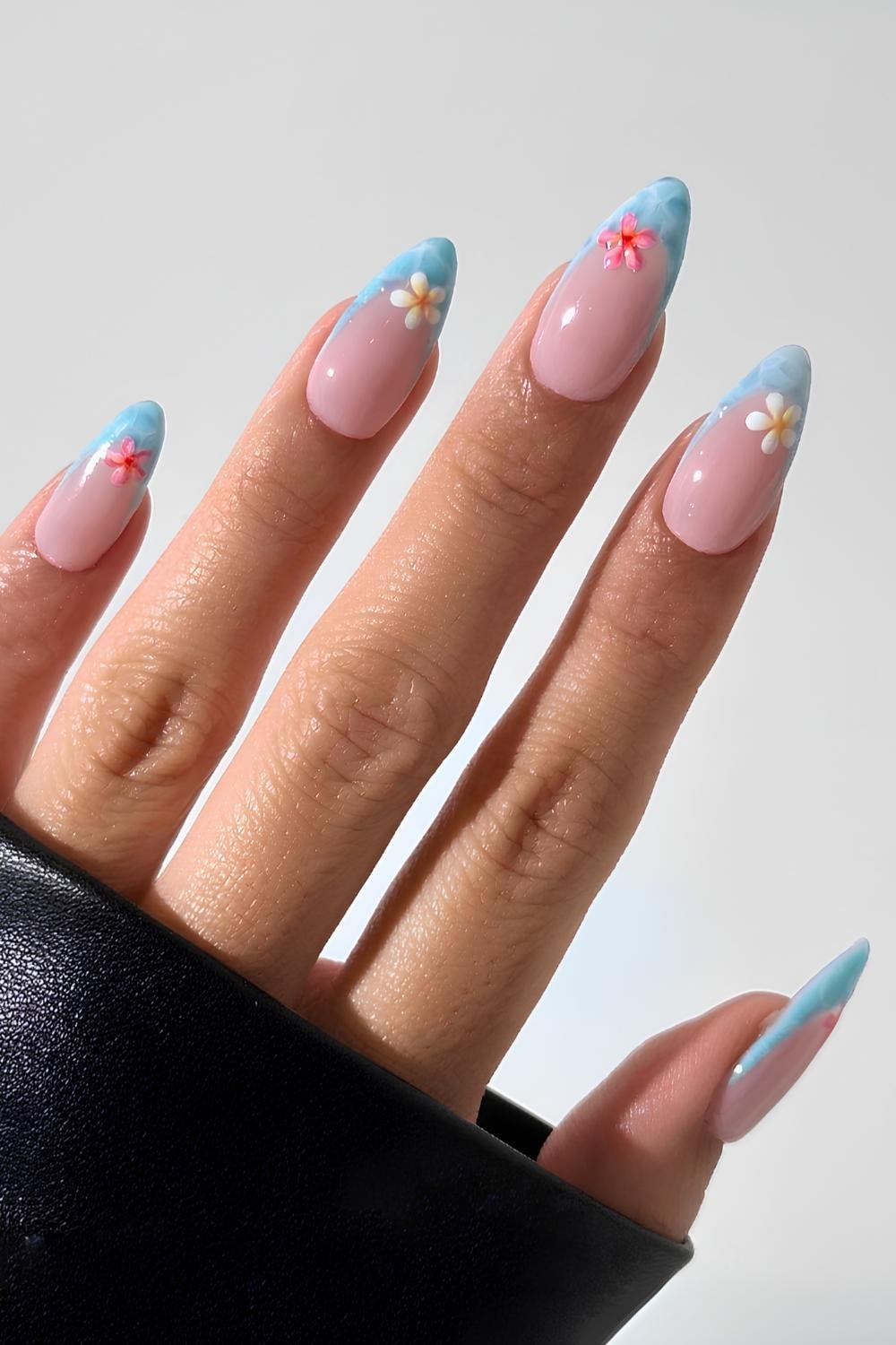 Blue beach-themed French manicure