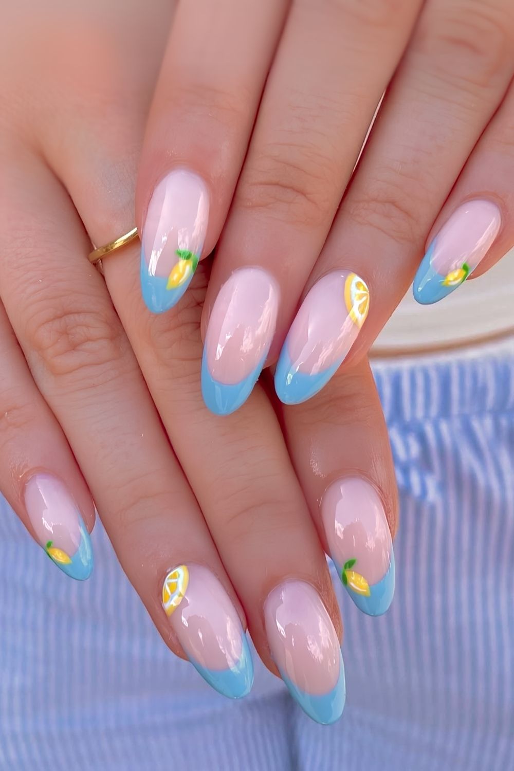 Blue chrome French mani with lemons