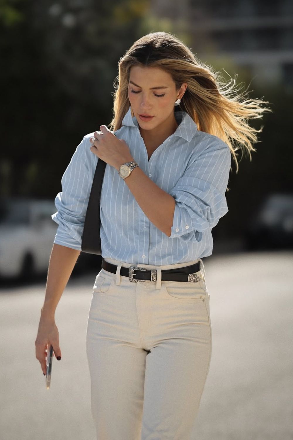 Blue striped shirt with cream jeans