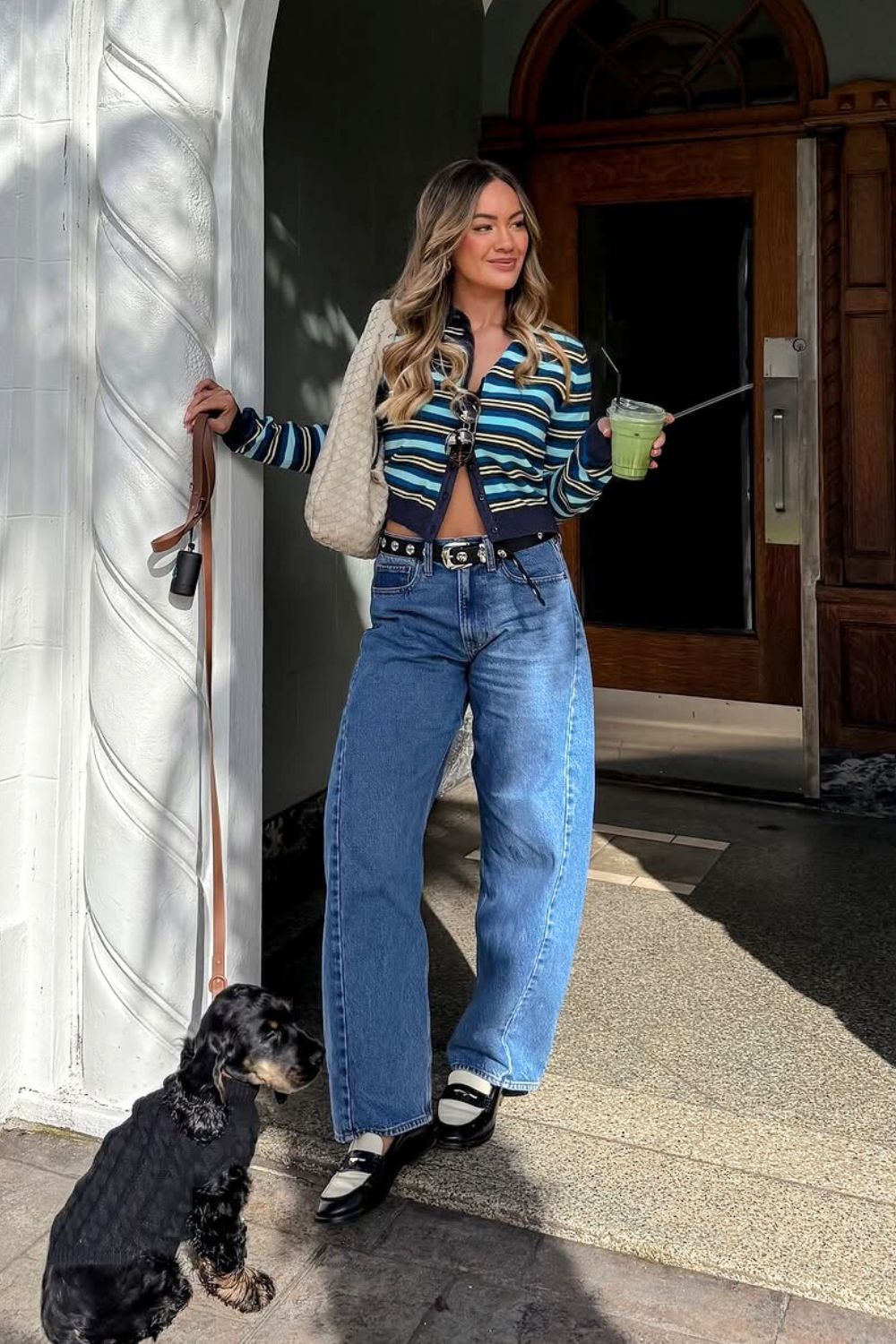 Blue stripped cardigan and wide leg jeans with loafers
