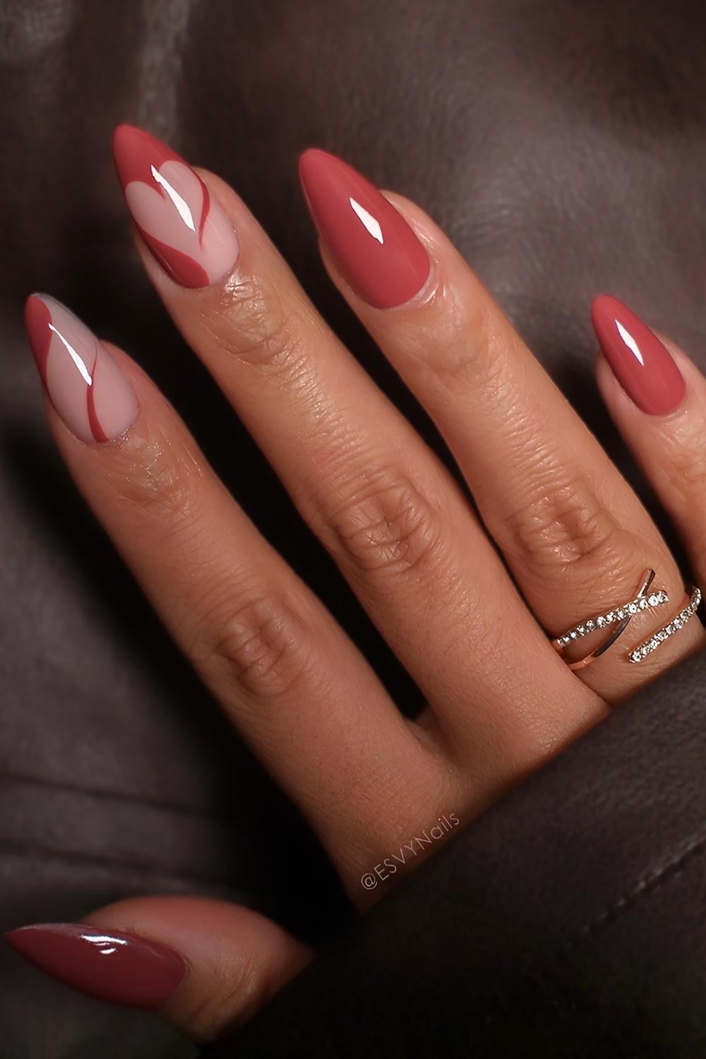 Blush red nails with negative space hearts