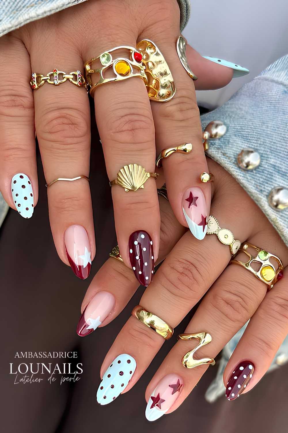 Brown and blue nails with stars and polka dots