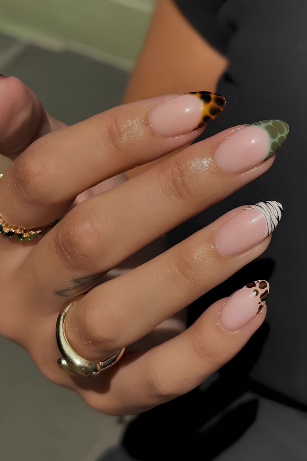 Brown and green animal print French manicure