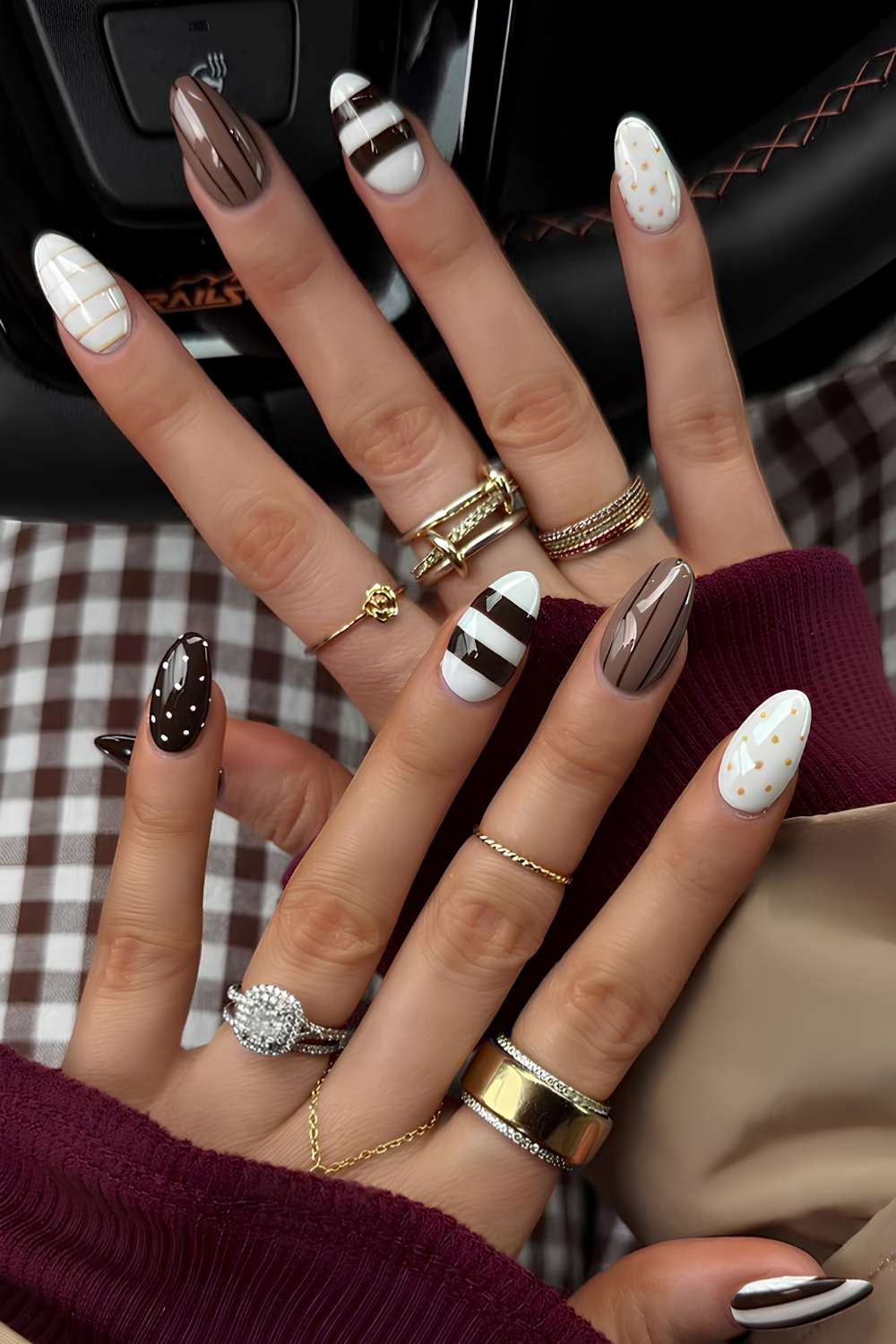 Brown and white nails with stripes and polka dots