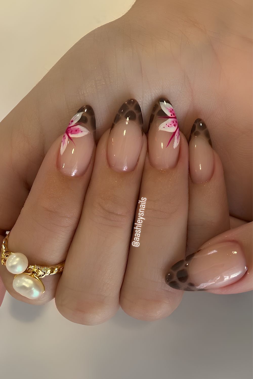 Brown animal print nails with flowers