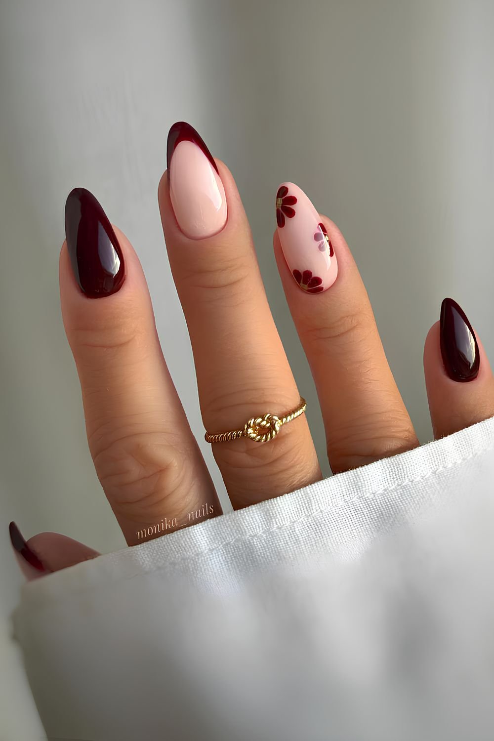 Burgundy floral manicure