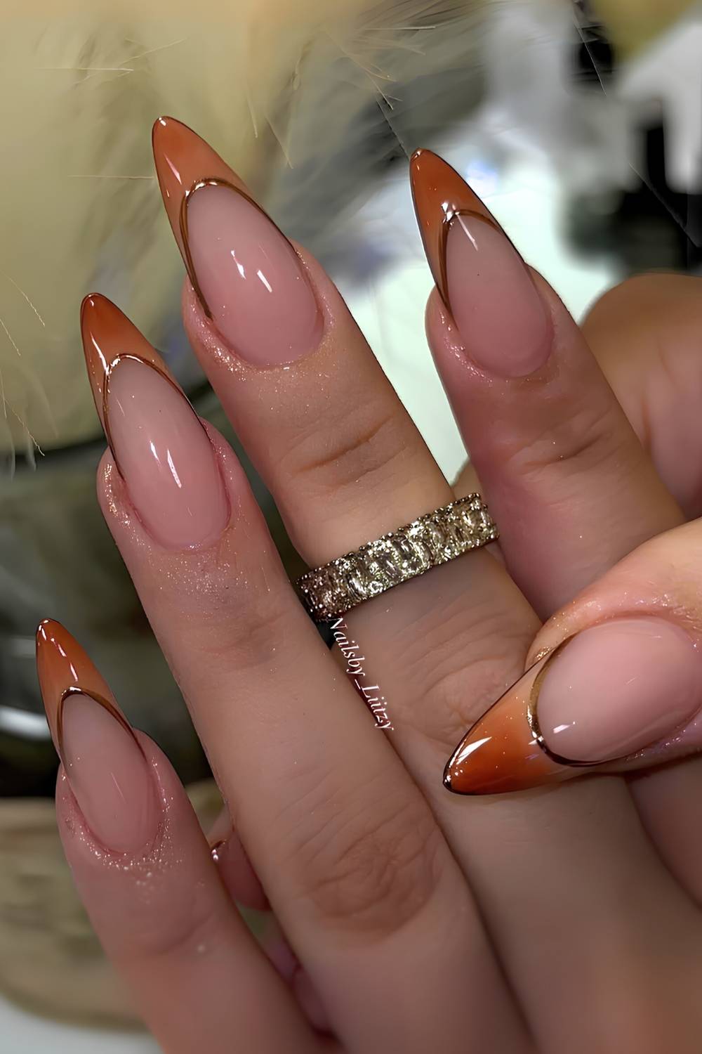 Burnt orange French mani with gold outlines