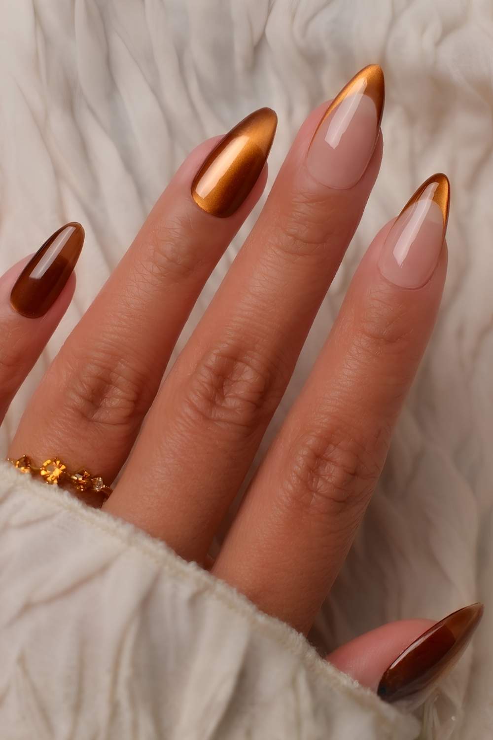 Burnt orange cat eye nails