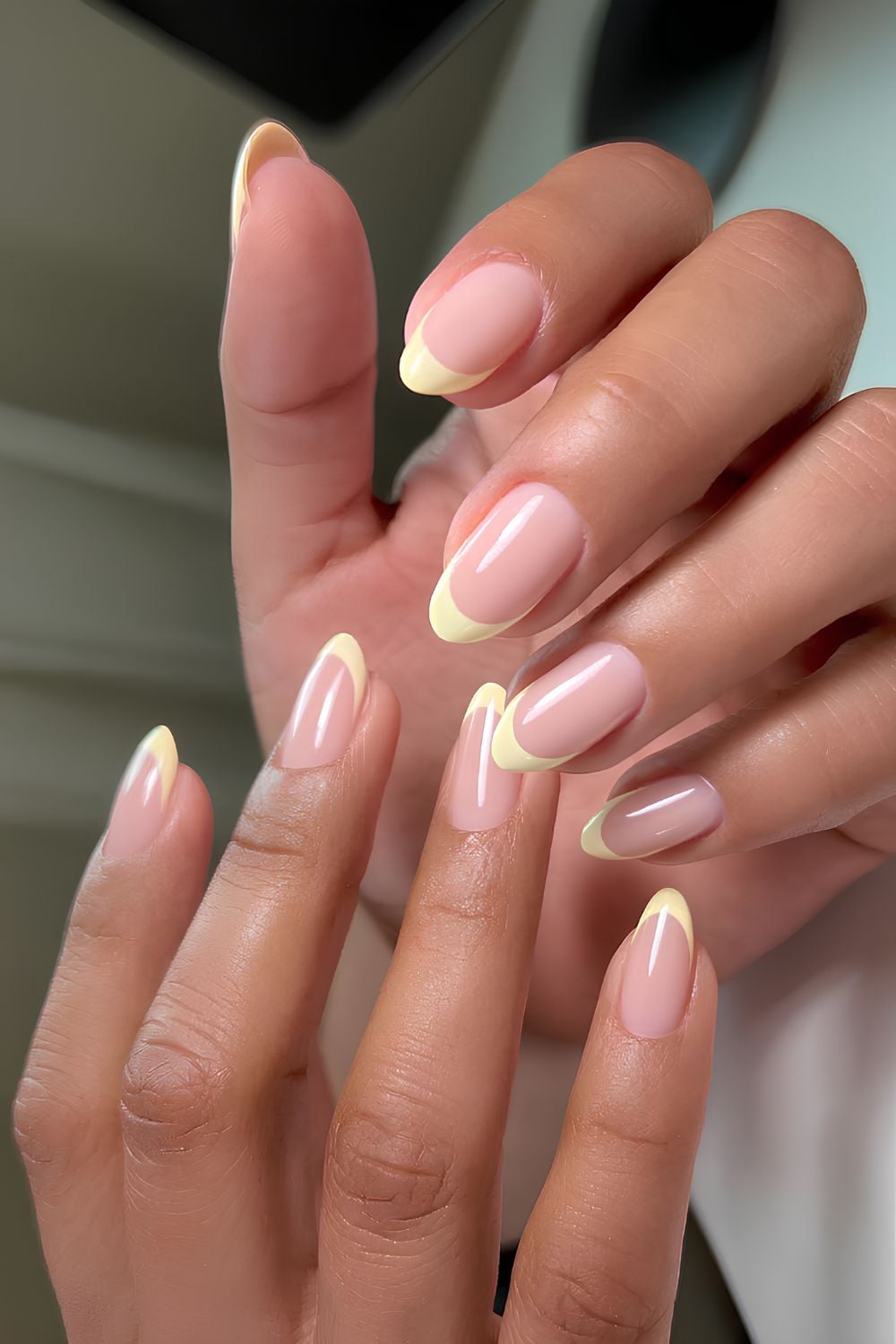Butter yellow French tip mani