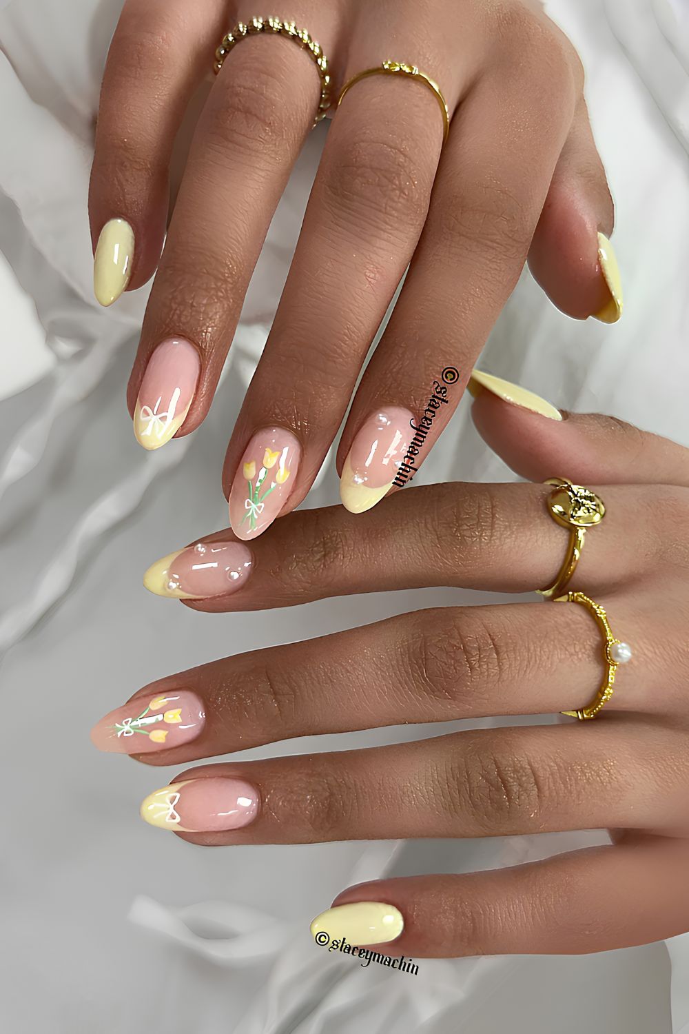 Butter yellow nails with tulips and bows