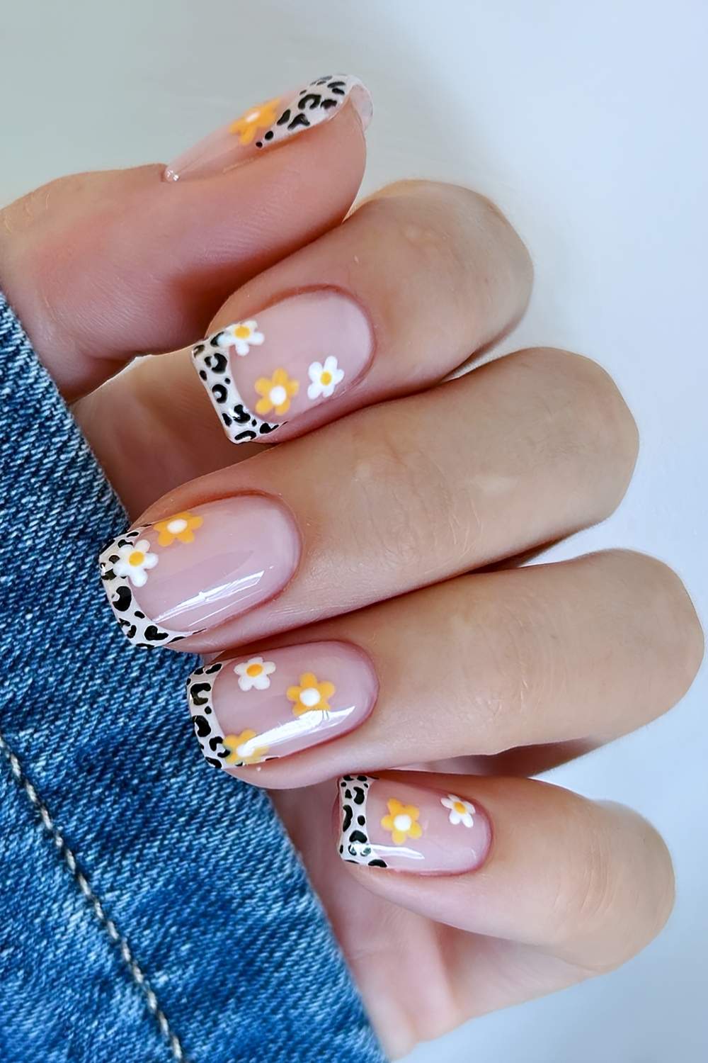 Cheetah French mani with orange and white florals