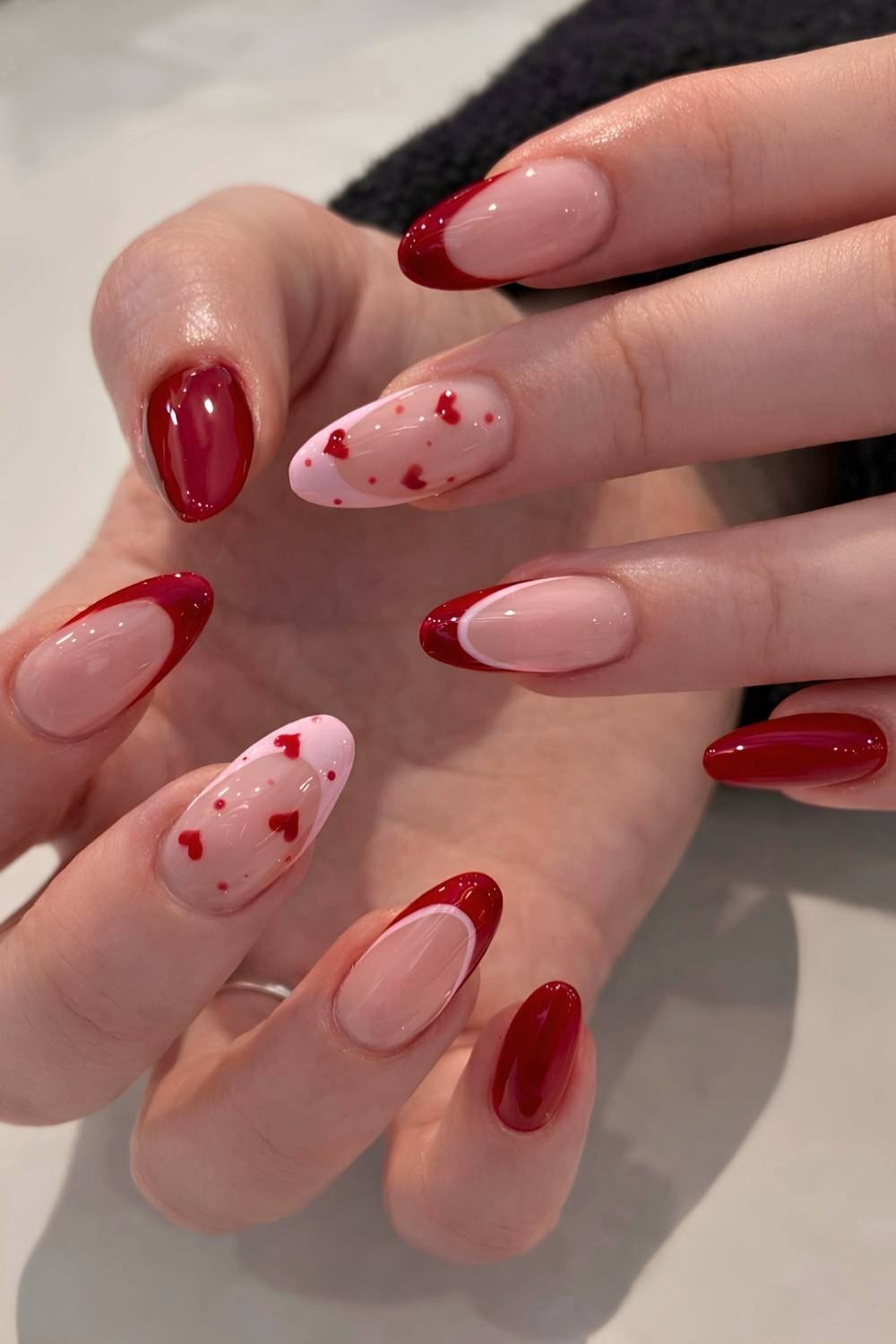 Cherry red and pink nails with hearts