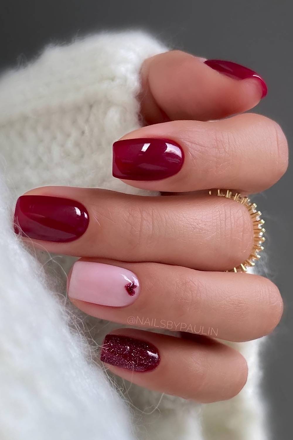 Cherry red mani with glitter and hearts
