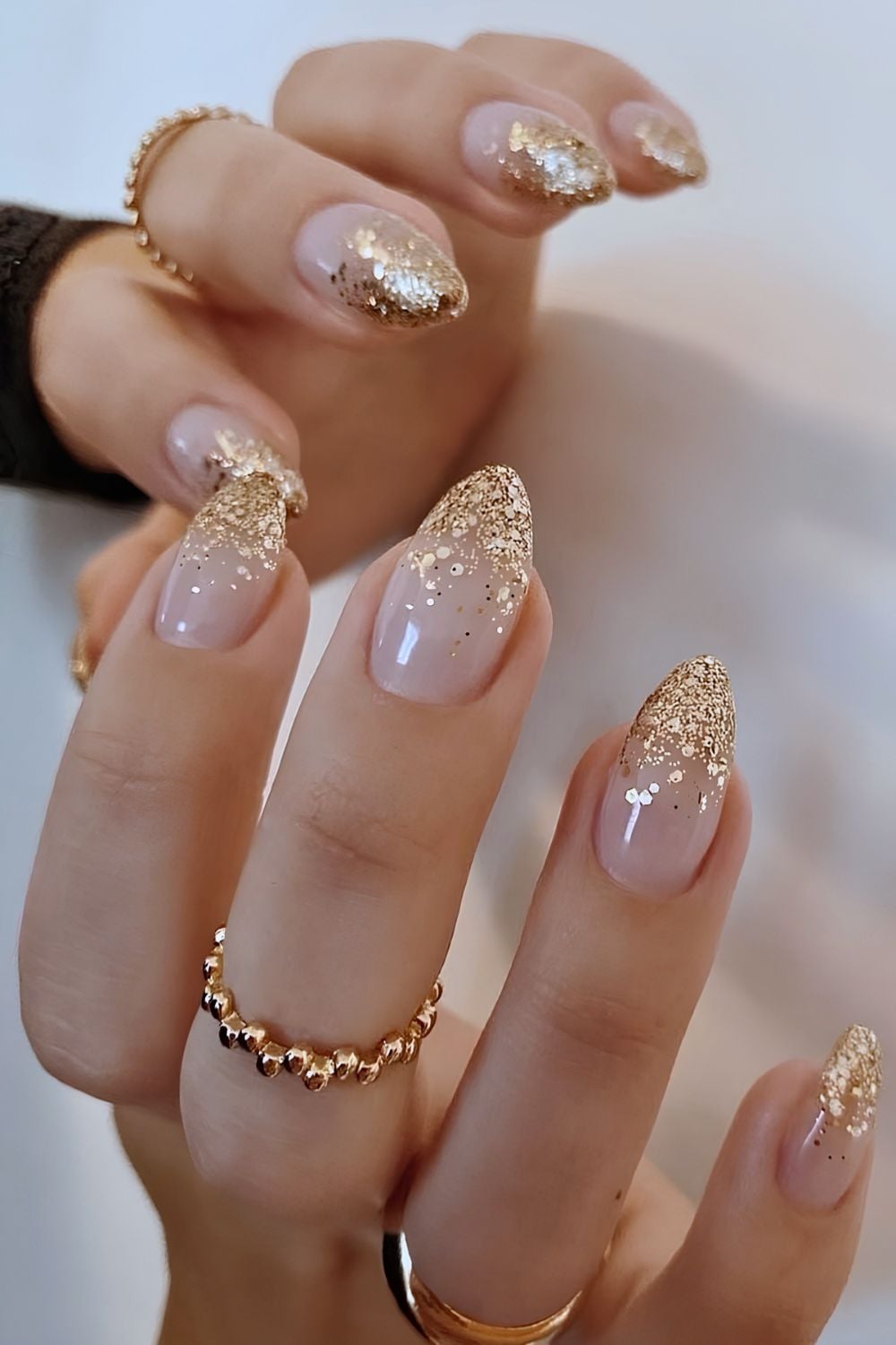 Chunky gold glitter ombre nails