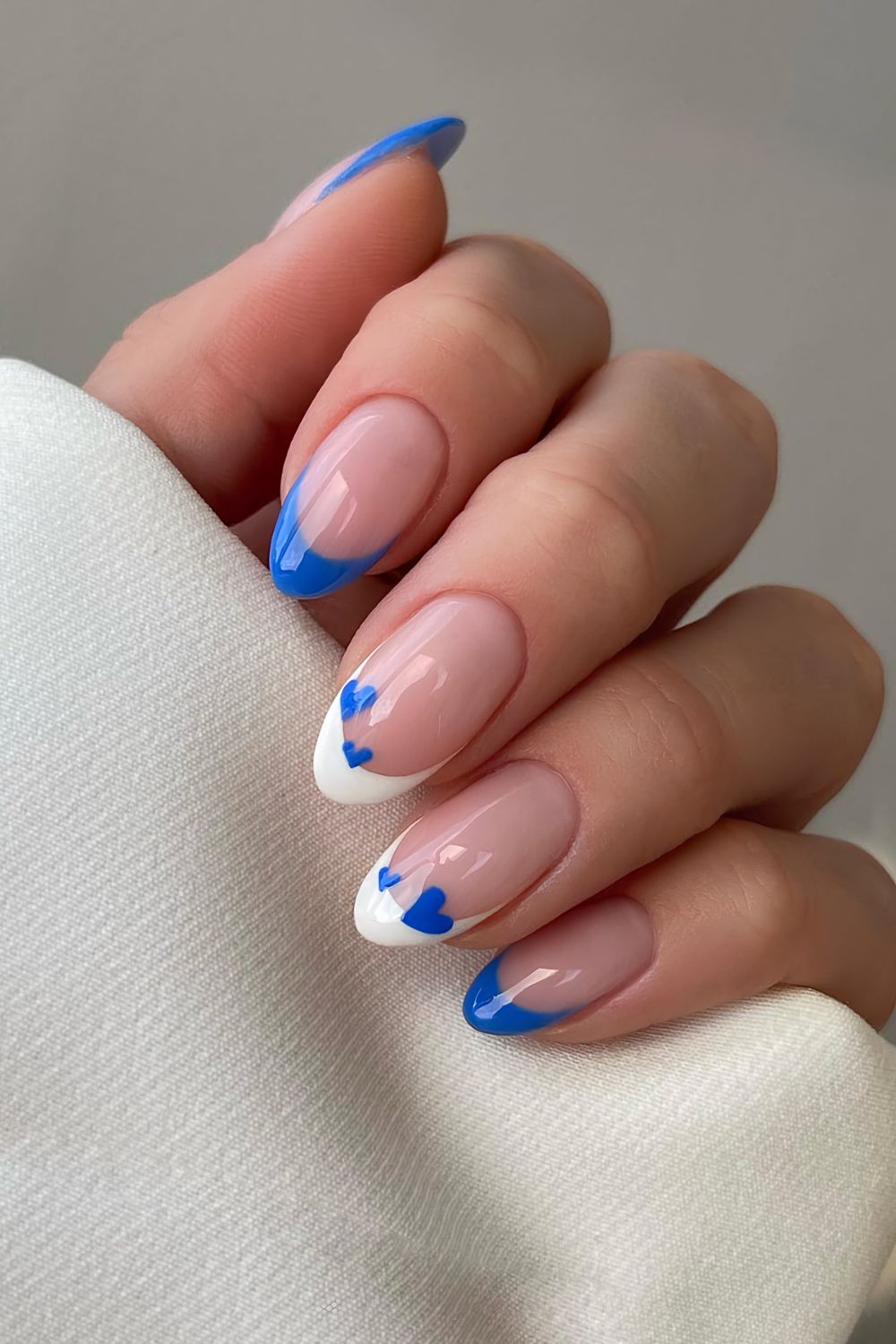 Cobalt blue and white French tips with heart accents