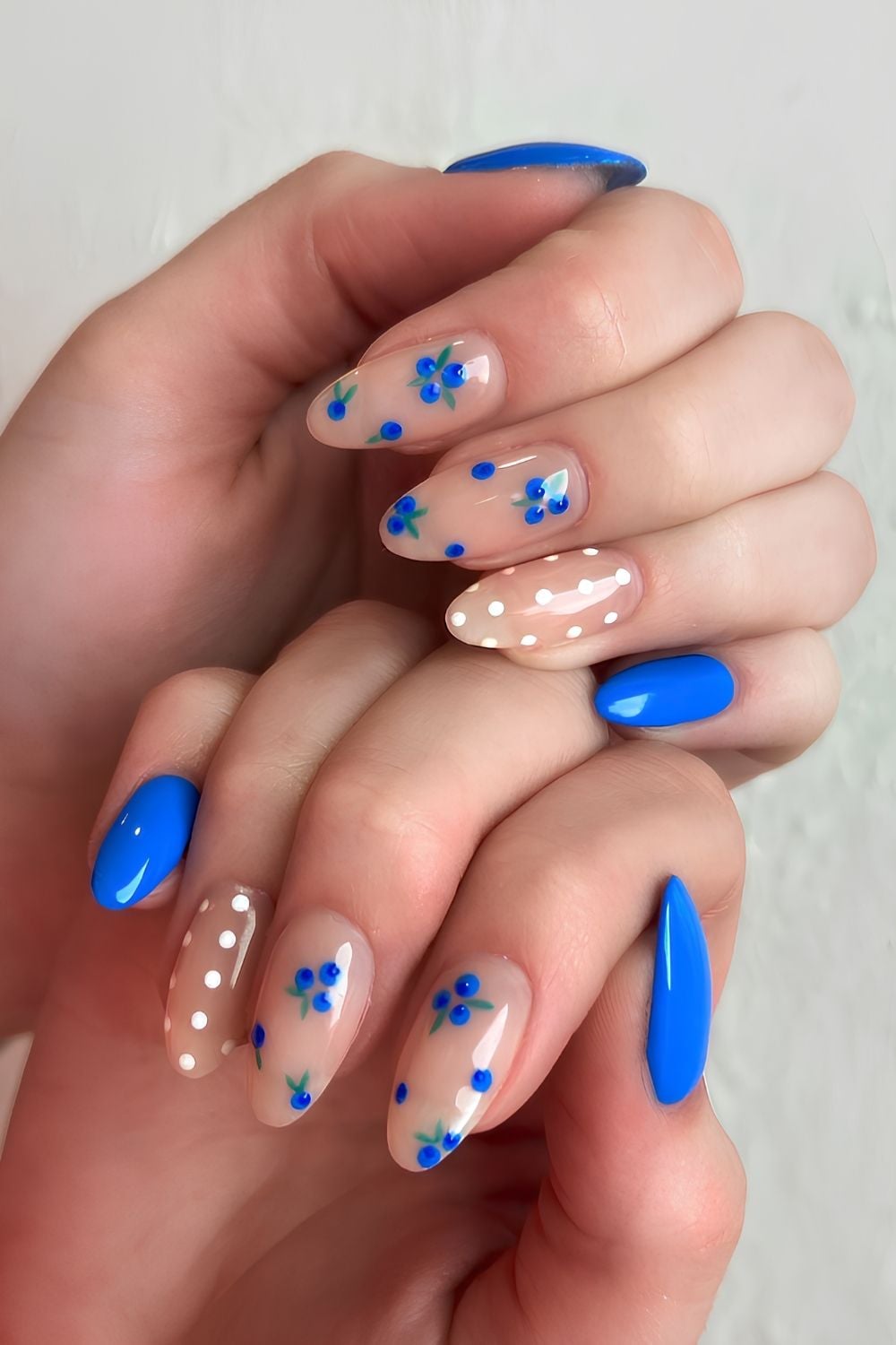 Cobalt blue mani with blueberries and polka dots
