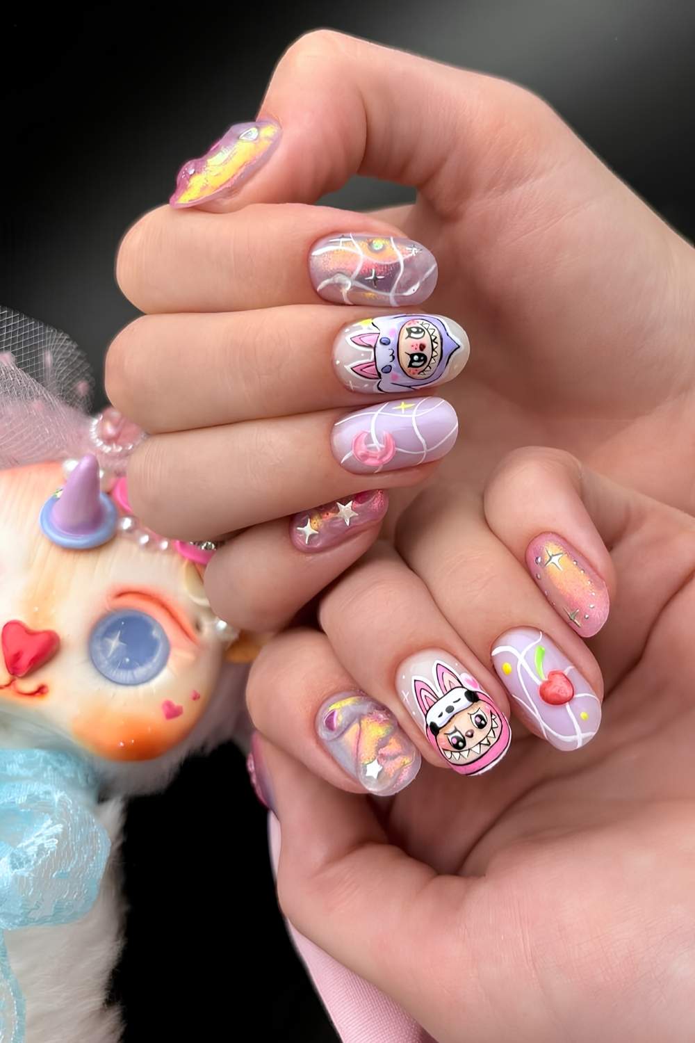 Colorful Labubu-themed nails